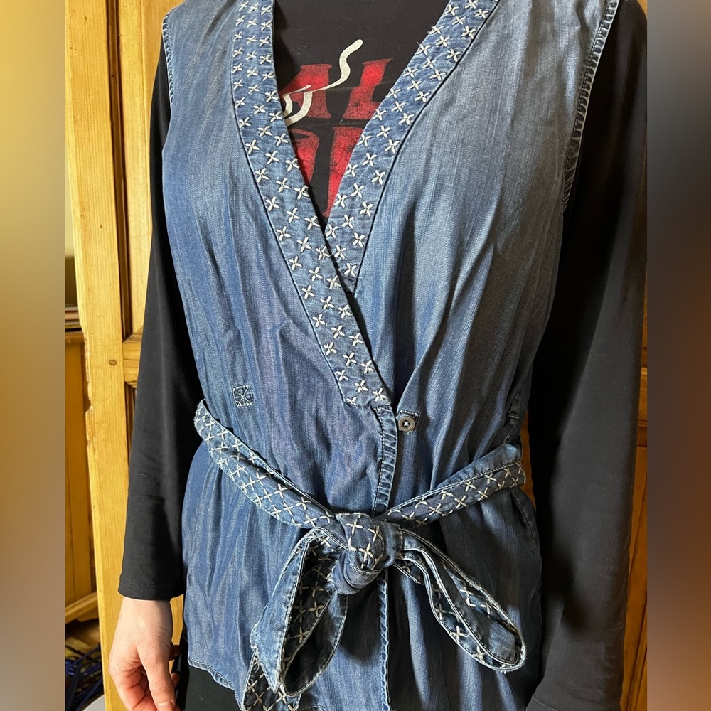 Holding horses denim vest